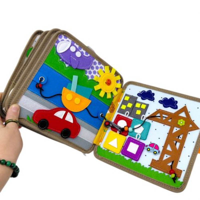 Мʼяка книжка-бізіборд 